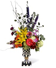 Large Mackenzie Childs Vase with flower arrangement